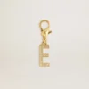 Anhänger in Form des Buchstabens E aus goldfarbenem Messing mit Kristallen