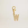 Anhänger in Form des Buchstabens W aus goldfarbenem Messing mit Kristallen