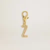Anhänger in Form des Buchstabens Z aus goldfarbenem Messing mit Kristallen