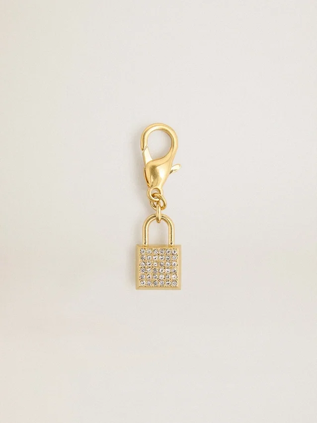 Anhänger in Schlossform aus goldfarbenem Messing mit Kristallen