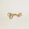 Antikgoldfarbene Brosche in Schlangenform