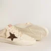 Ball Star Sabots aus elfenbeinfarbenem Nappa mit bronzefarbenem Glitzerstern
