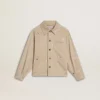 Beige Kinderjacke mit mehrfarbigen Spritzern