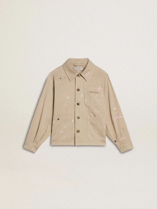 Beige Kinderjacke mit mehrfarbigen Spritzern
