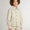 Beige Kinderjacke mit mehrfarbigen Spritzern