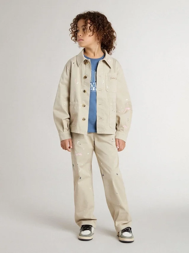 Beige Kinderjacke mit mehrfarbigen Spritzern