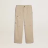 Beigefarbene Chino-Hose für Kinder mit bunten Farbtupfern