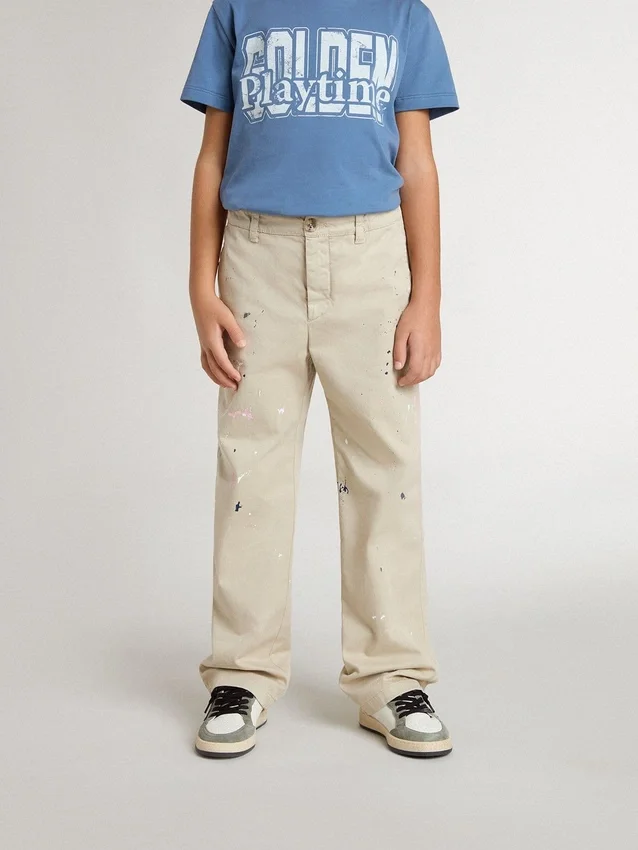 Beigefarbene Chino-Hose für Kinder mit bunten Farbtupfern