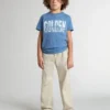 Beigefarbene Chino-Hose für Kinder mit bunten Farbtupfern