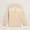 Beigefarbene Damen-Strickjacke mit «Golden»-Schriftzug auf dem Rücken