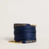Blaue Baumwollschnürsenkel mit kontrastierendem goldfarbenem Logo