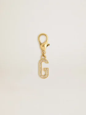 Buchstabe G als Anhänger aus goldfarbenem Messing mit Kristallen