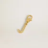 Buchstabe-J-Anhänger aus goldfarbenem Messing mit Kristallen