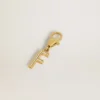 Buchstaben-F-Anhänger aus goldfarbenem Messing mit Kristallen