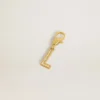 Buchstaben-L-Anhänger aus goldfarbenem Messing mit Kristallen