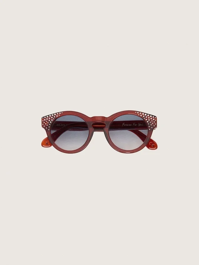 Cameron Panthos-Sonnenbrille mit honigfarbenem Rahmen, Edelsteinen und blauen Gläsern