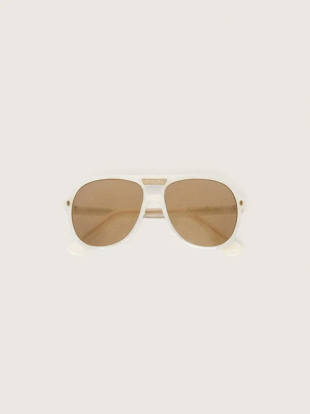 Charlie-Sonnenbrille mit perlweissem Rahmen und goldenen Gläsern