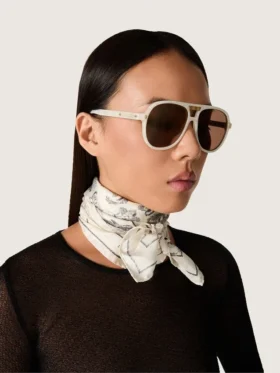 Charlie-Sonnenbrille mit perlweissem Rahmen und goldenen Gläsern
