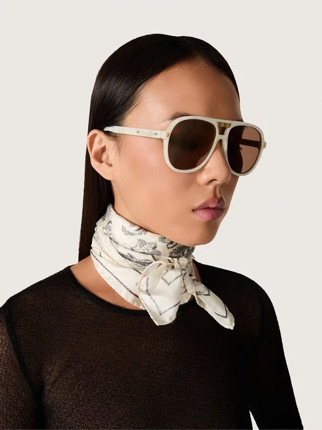 Charlie-Sonnenbrille mit perlweissem Rahmen und goldenen Gläsern
