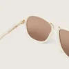 Charlie-Sonnenbrille mit perlweissem Rahmen und goldenen Gläsern