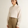 Cremefarbenes, kurzes Damen-Sweatshirt aus Baumwolle mit Kristallen auf der Vorderseite