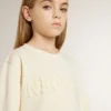 Cremefarbenes Sweatshirt für Mädchen mit Aufnäher-Schriftzug