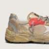 Herren-Modell «Dad-Star» aus goldlaminiertem Leder und Mesh mit weissem Lederstern und goldener Lederlasche an der Ferse