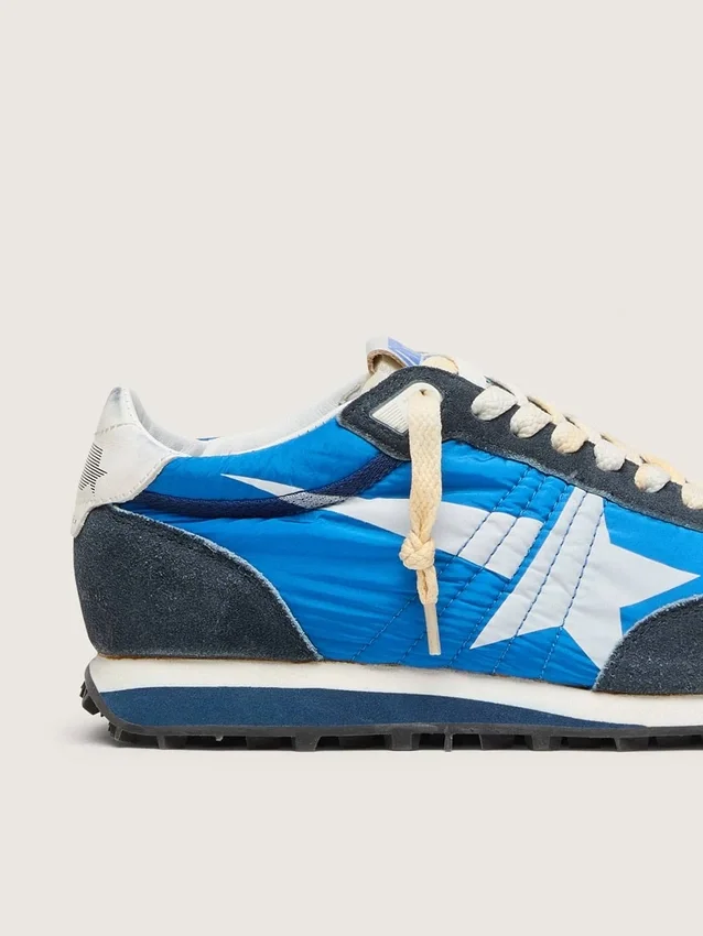 Damen-Marathon mit blauem Nylon-Obermaterial und weissem Stern