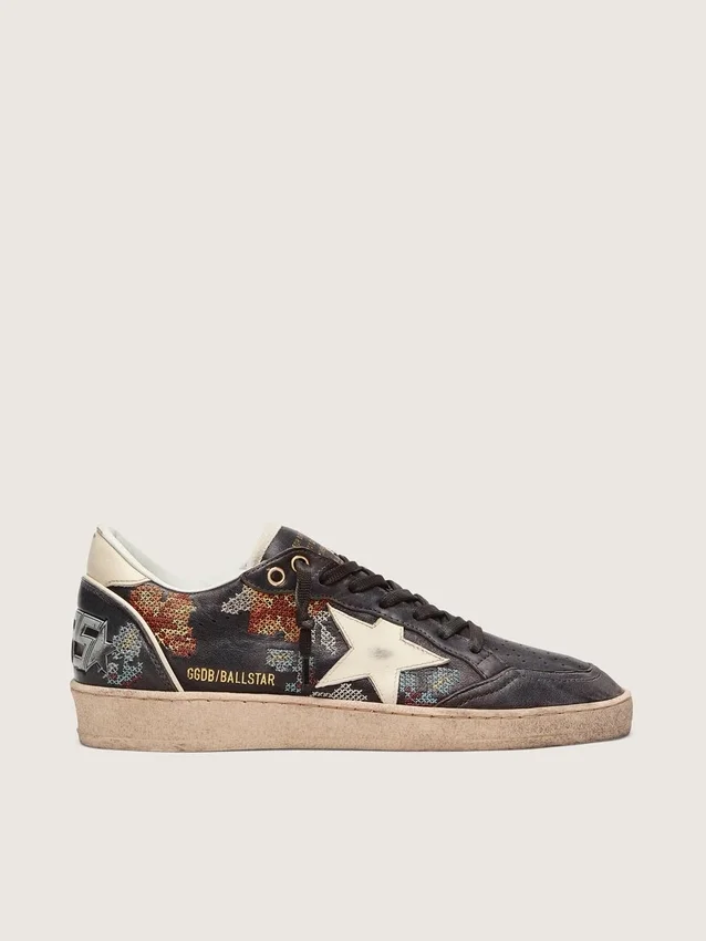 Damen-Modell «Ball Star LTD» aus Ebenholz-Nappa mit mehrfarbiger Stickerei und weissem Stern