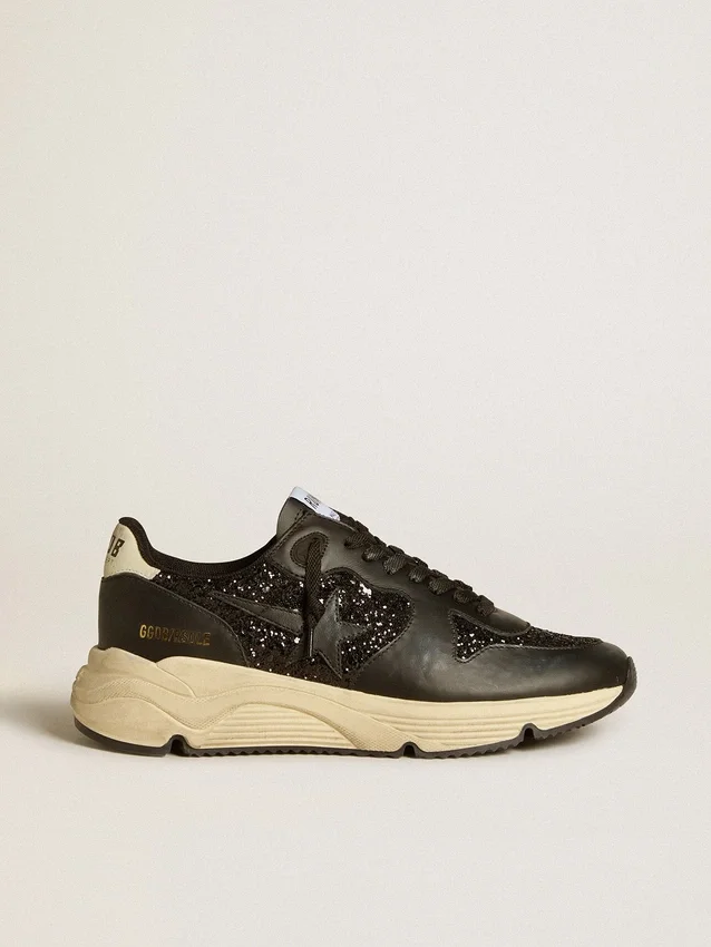 Damen-Running Sole in schwarzem Glitzer mit Lederstern und Fersenlasche aus Nubukleder
