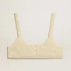 Damen-Top mit Perlenkette