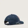 Denimblaue Baseballkappe mit rot-weissem Frottee-«Golden»-Aufnäher