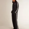 Dunkelblaues Sweatshirt mit Reissverschluss, weissem Streifen und kontrastierenden Sternen