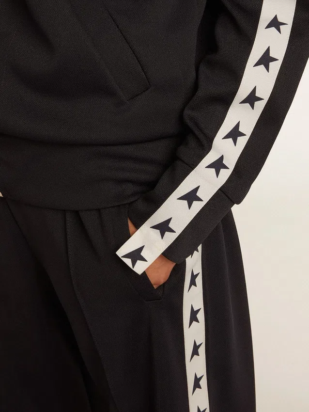 Dunkelblaues Sweatshirt mit Reissverschluss, weissem Streifen und kontrastierenden Sternen
