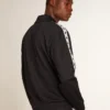 Dunkelblaues Sweatshirt mit weissem Streifen und kontrastierenden blauen Sternen