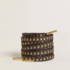 Dunkelgraue Lurex-Schnürsenkel mit kontrastierenden goldenen Sternen