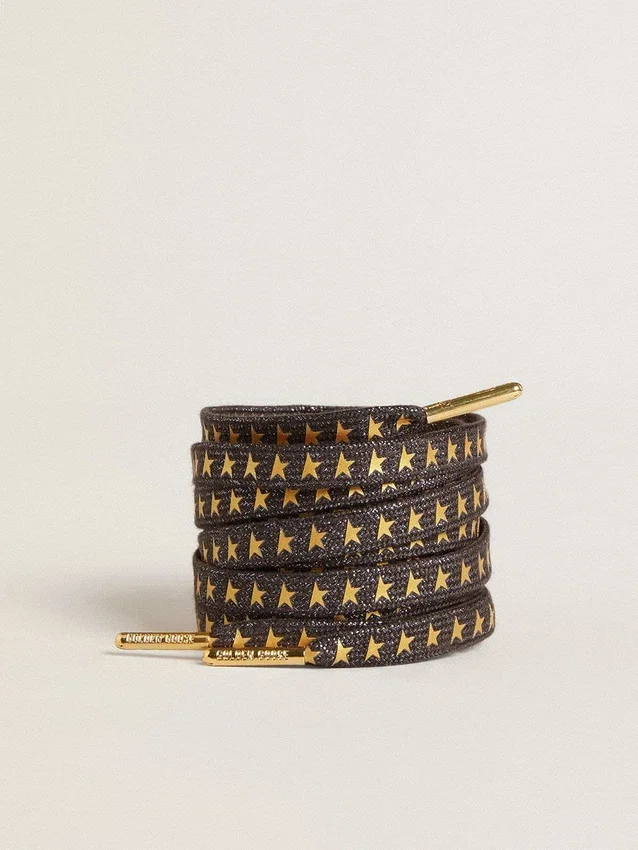 Dunkelgraue Lurex-Schnürsenkel mit kontrastierenden goldenen Sternen
