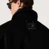 Gepolsterte Herren-Kurzjacke aus schwarzer Baumwolle mit Lederkragen