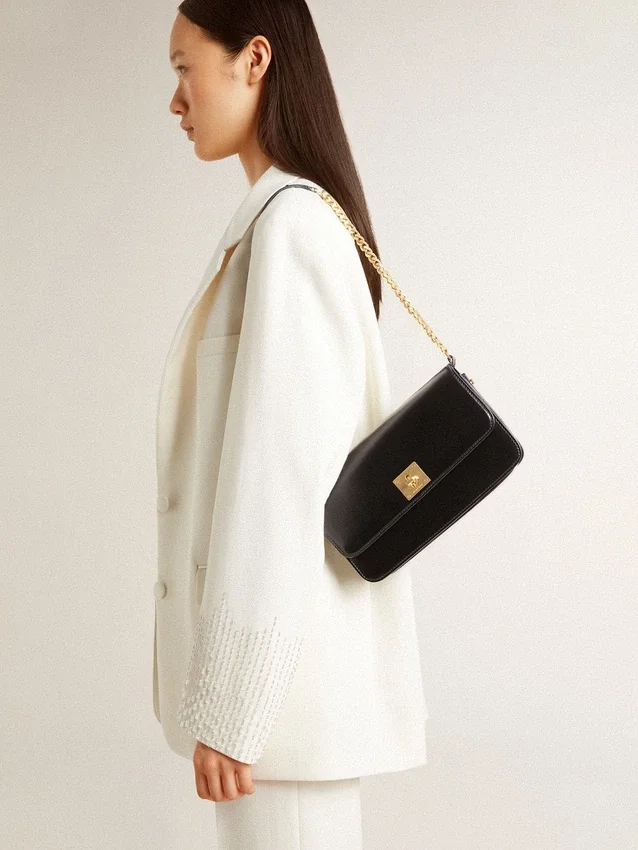 Gioia-Tasche aus schwarzem, geprägtem Leder mit goldenen Details