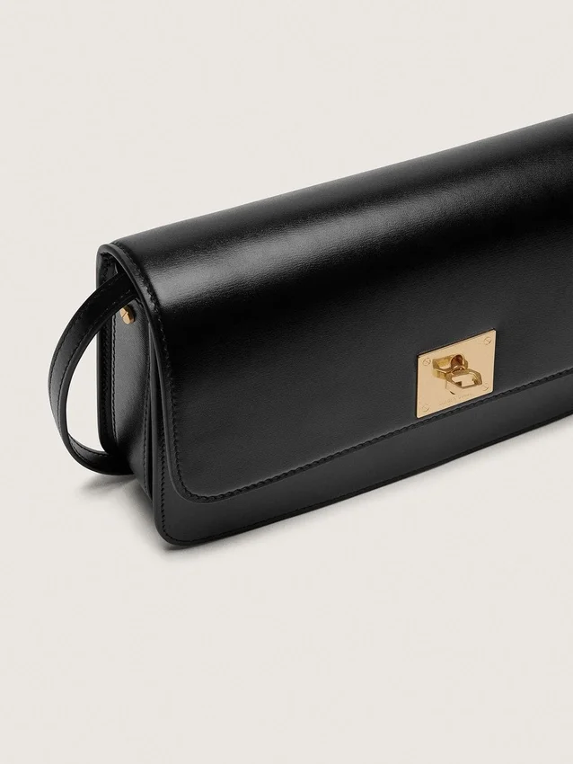 Gioia-Tasche aus schwarzem, geprägtem Leder mit goldenen Details