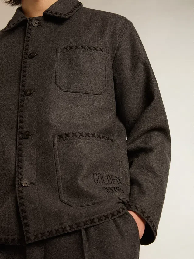 Grau melierte Wolljacke mit Knopfverschluss