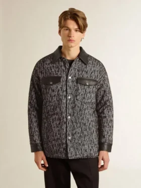 Graue Jacke im Fischgrätenmuster mit schwarzen Lederdetails