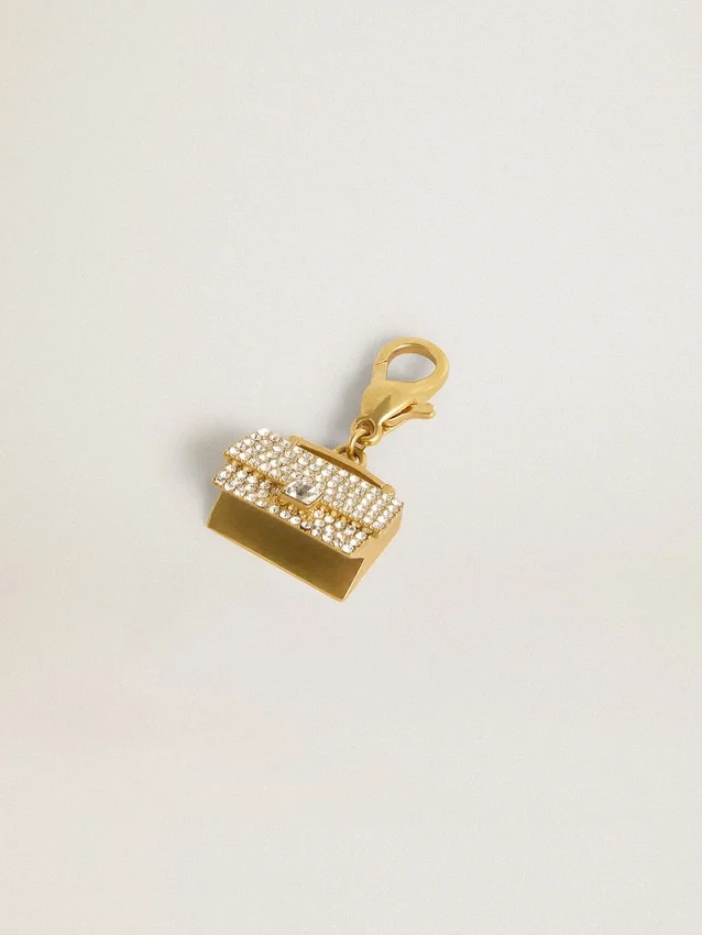 Handtaschenförmiger Anhänger aus goldfarbenem Messing mit Kristallen