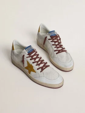 Herren-Sneaker «Ball Star» aus weissem Nappaleder mit gelbem Lederstern im Animal-Print und Fersenlasche