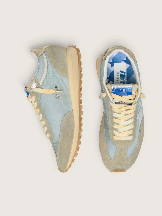 Herrenmodell «Marathon» mit hellblauem Nylon-Obermaterial und pastellblauem Stern