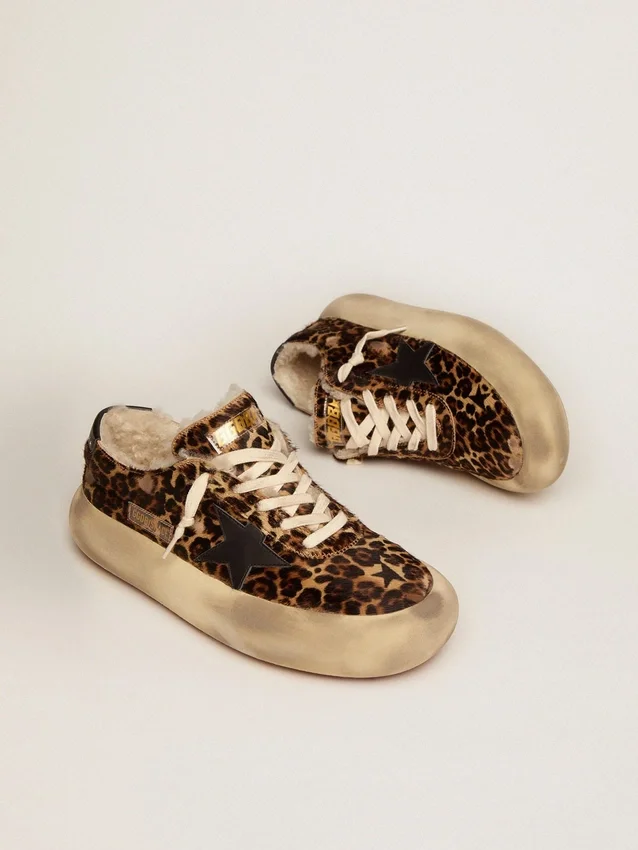 Herrenmodell «Space-Star» aus Ponyleder mit Animal-Print und Lammfellfutter