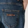 Jeans für Jungen mit unversäuberten Säumen und Stickerei