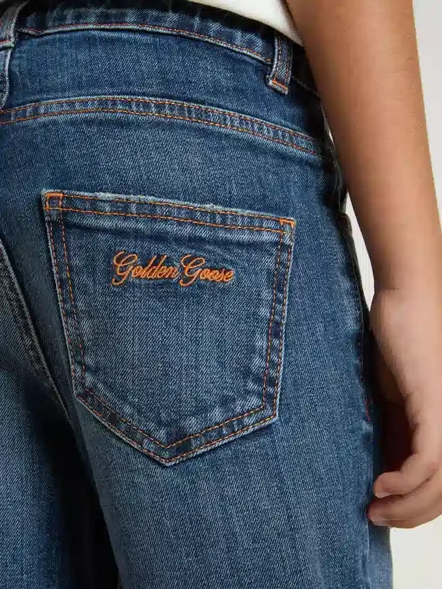 Jeans für Jungen mit unversäuberten Säumen und Stickerei