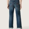 Jeans für Jungen mit unversäuberten Säumen und Stickerei
