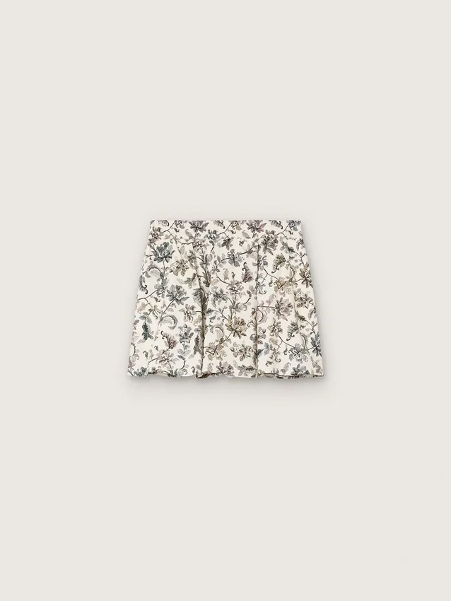 Journey-Minirock für Mädchen aus weissem Baumwoll-Canvas mit grünem Blumenprint